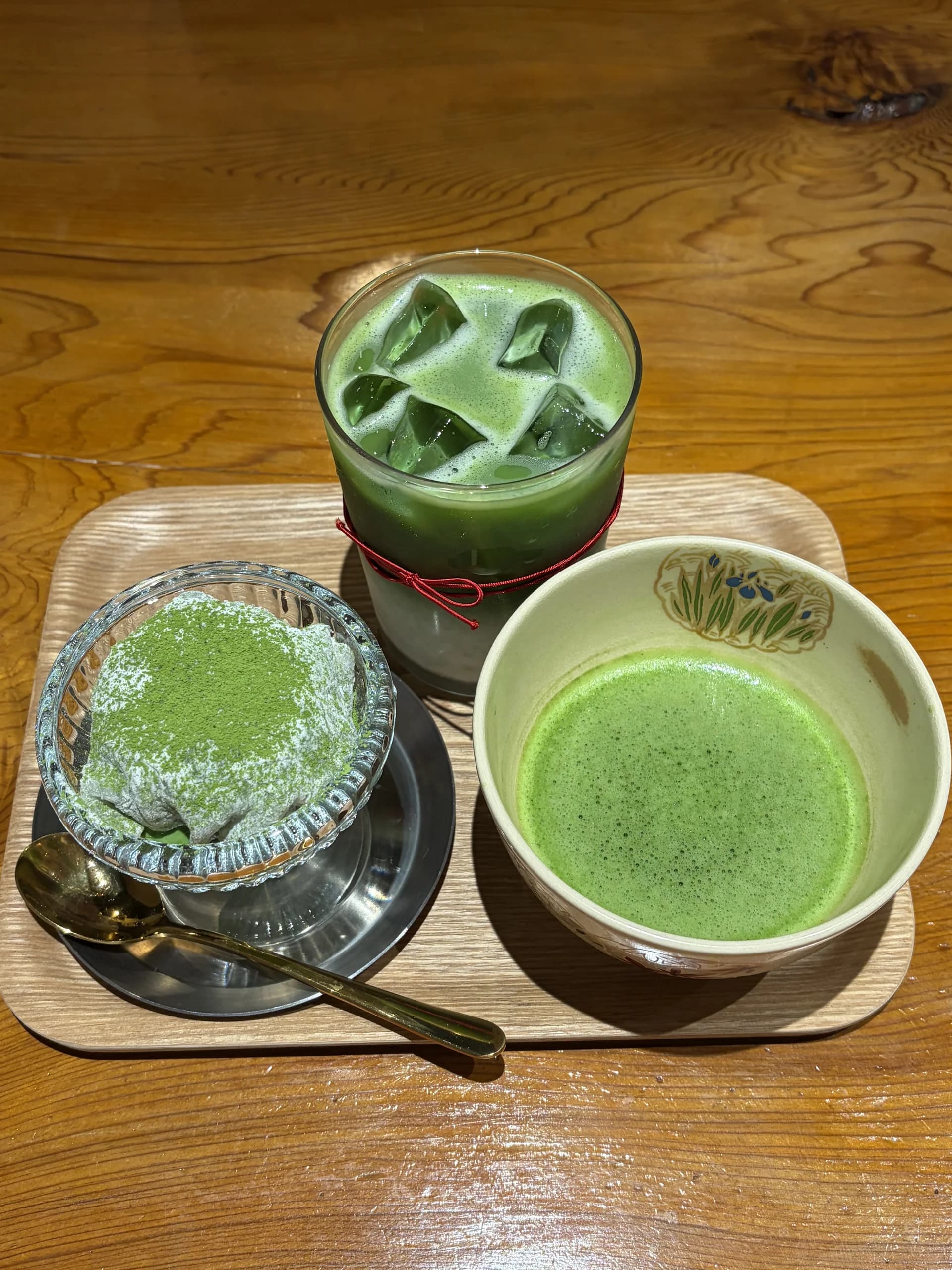 Matcha powder sifted into a glass teapot